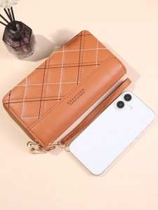 Brown leather minimalist double zipper wallet with rhombus stitching and wrist strap