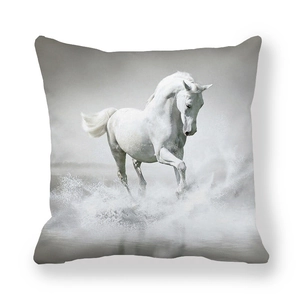 Detail of running white horse print on soft peach skin fabric square pillowcase