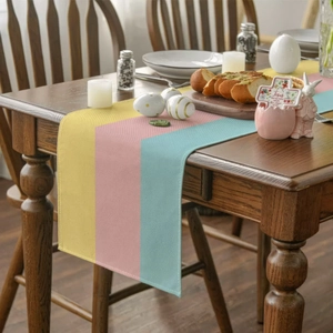 Striped table runner in macaron yellow, pink and blue for Easter home dining decoration