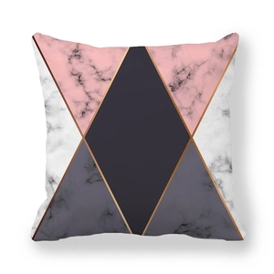 Macro detail of geometric marble pattern on soft peach skin pillowcase with gold lines