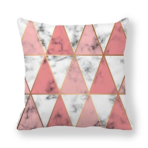 Close-up of geometric peach skin pillowcase with pink marble and gold lines