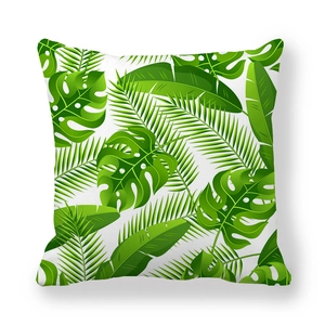 Detail shot of tropical leaf pattern on white peach skin fabric cushion cover
