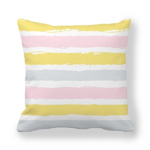 Detail of peach skin pillowcase featuring yellow, pink, and grey hand-painted stripes