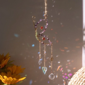 Handmade butterfly suncatcher with purple natural stones and faceted crystal prisms