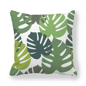 Tropical monstera leaf pattern throw pillow case with fresh green foliage on white base