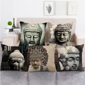 Linen cushion covers featuring diverse Buddha and Mandala prints on a sofa setting