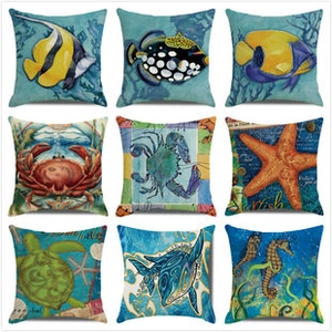 Detail showing a 9-piece set of nautical cushion covers with sea life watercolor patterns