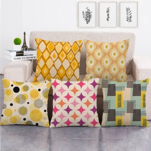 Set of 5 linen pillow covers featuring yellow diamond and orange teardrop geometric patterns