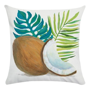 Tropical nut and palm leaf pattern throw pillow cover on soft off-white textured fabric