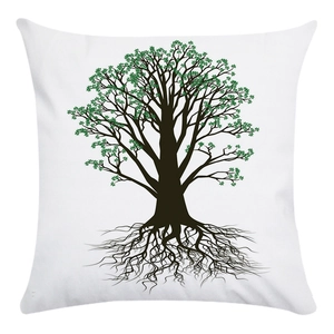 Detail of soft white pillowcase featuring a vibrant green fortune tree print with roots