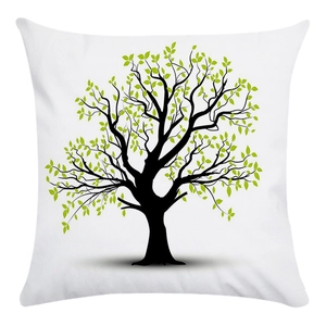 Detail shot of the square pillowcase featuring a green vibrant tree of life print pattern