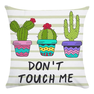 Detail of square cushion cover with cactus prints and Don't Touch Me text slogan