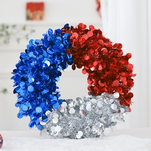 Close-up of sparkling red blue and silver sequin patriotic wreath for home decor