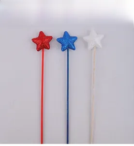 Detail of red white and blue glitter star wands for American Independence Day decor