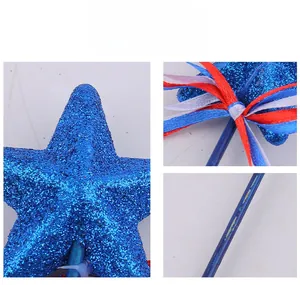 Detailed view of patriotic star wand with blue glitter finish and red ribbons