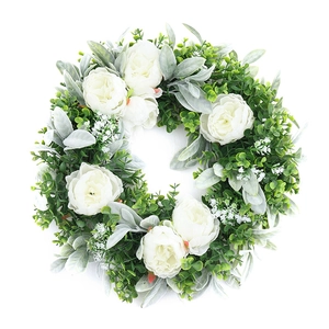Artificial peony and eucalyptus wreath for front door wall decoration on white background