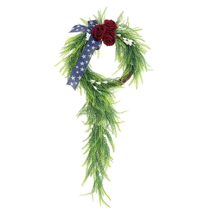 American Independence Day wreath with green ferns, red roses and star pattern bow decor