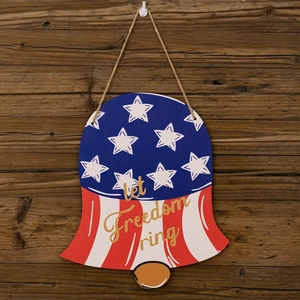 Patriotic bell-shaped wooden sign with American flag design and Let Freedom Ring text