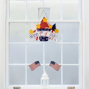 Cupcake shaped Happy 4th of July hanging wooden sign with mini USA flags and white lantern