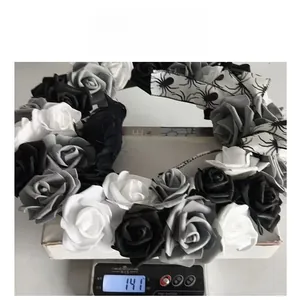 Weight measurement of 141g for a gothic black and white rose Halloween wreath