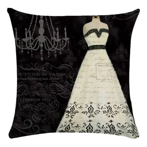 Macro shot of French vintage oil painting pillowcase with couture dress pattern and text