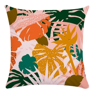 Close-up of tropical floral pattern on soft decorative square cushion cover