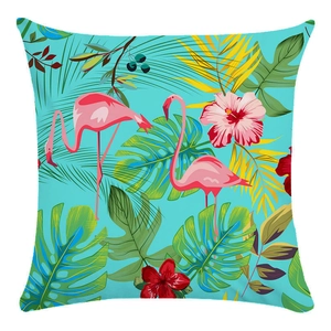 Close-up of tropical flamingo and monstera leaf print on soft square pillowcase