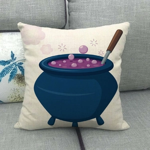 Close-up of linen cushion cover with cartoon magic cauldron for Halloween home decor