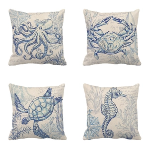 Set of four linen throw pillow covers featuring vintage hand-drawn blue sea life patterns