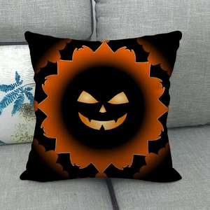 Halloween pumpkin cushion cover with orange Jack-o'-lantern face on black linen pillow case
