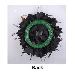 Detail of Halloween wreath back showing the durable green plastic support frame base