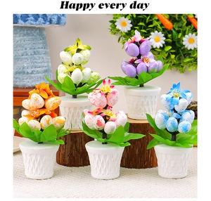 Easter foam speckled egg bonsai set in white lattice pots with colorful festive foliage