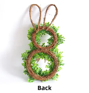 Rear view of Easter bunny wreath showing natural grapevine structure and green leaves
