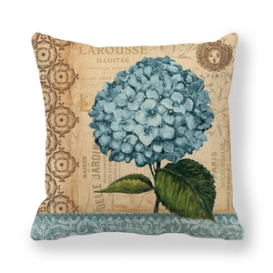 French vintage linen pillow cover featuring blue hydrangea flower and retro Paris print