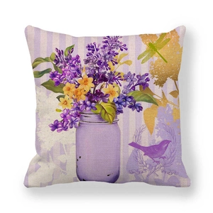 Detail of linen pillowcase with colorful peony floral print and dragonfly pattern