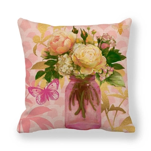 Detailed texture of linen pillowcase with floral bouquet in purple glass vase