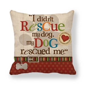 Detail of linen pillow cover with printed quote I didn't rescue my dog, my dog rescued me