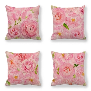 Set of 4 linen pillow covers featuring detailed pink rose floral prints on white