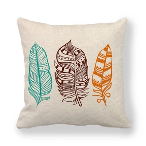 Modern linen pillow cover featuring bohemian arrow feathers in teal, brown and orange