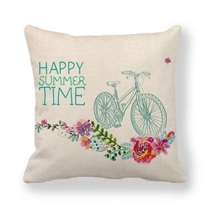 Detail of linen cushion cover featuring a vintage bicycle and Happy Summer Time text