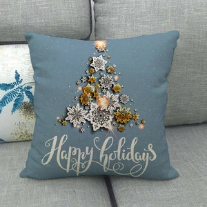 Close-up of linen pillowcase with snowflake Christmas tree and Happy Holidays text