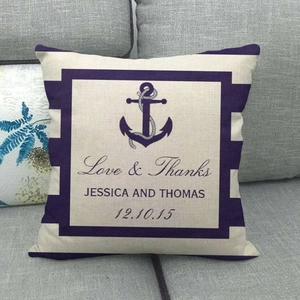 Macro view of linen cushion cover showing custom anchor print and textured fabric