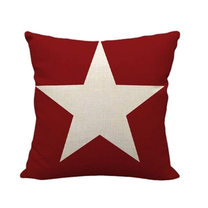 Square dark red linen pillowcase featuring a large white star pattern in the center