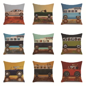 Detail view of nine square linen cushion covers featuring vintage cartoon car and dog prints
