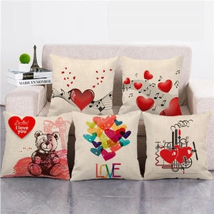 Detailed set of five linen Valentine's Day pillows featuring hearts and teddy bear motifs