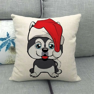 Detail of linen Christmas pillow case featuring a cartoon husky puppy on a gray sofa