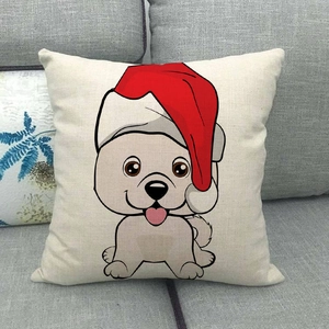 Detail of linen Christmas pillowcase featuring a cartoon dog wearing a festive red hat