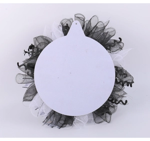 Halloween wreath back view with white round support plate and black mesh decoration