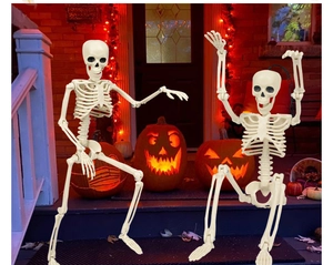 Detail of two 40cm poseable plastic skeletons for Halloween party and garden decoration