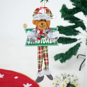 Detail of Christmas plush bear with long legs and a Navidad sign for tree decoration
